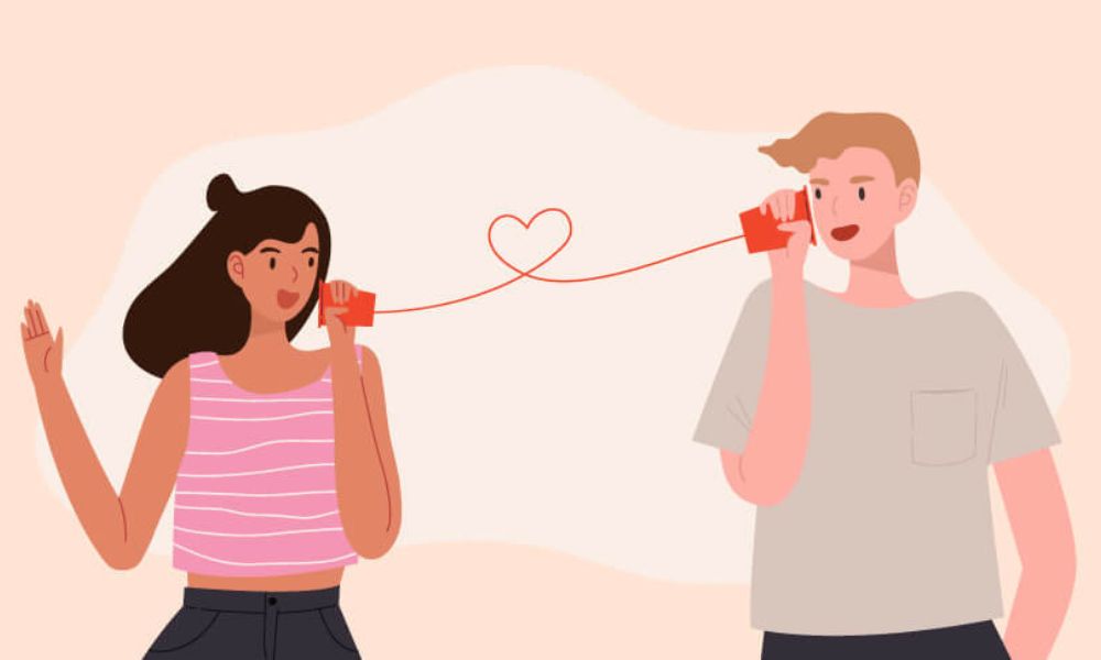 Illustration of a couple talking through cups connected with a heart string, symbolizing communication and Words of Affirmation love language