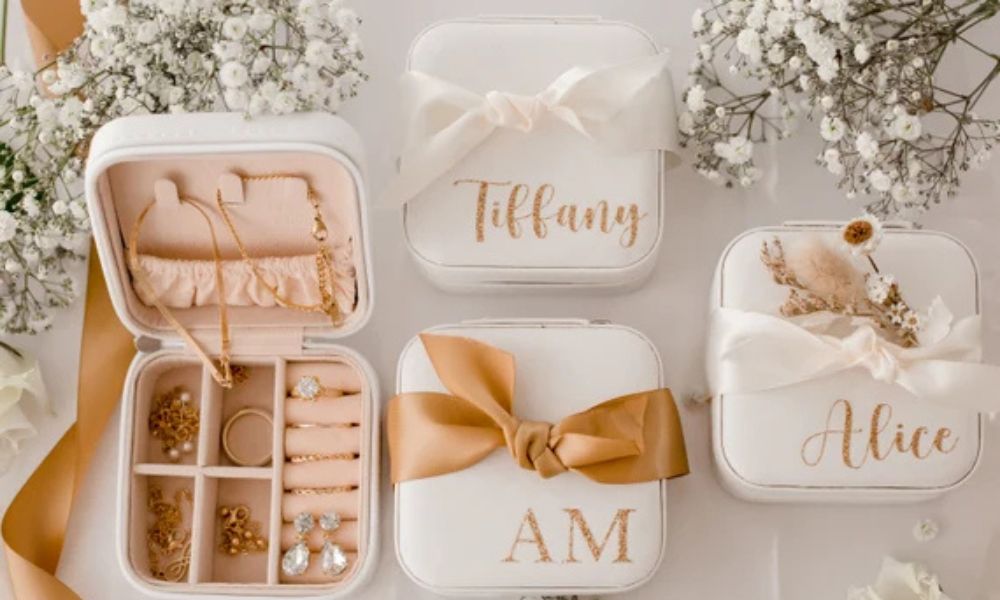 Elegant jewelry boxes with rings, earrings, and accessories symbolizing jewelry as gifts in love language