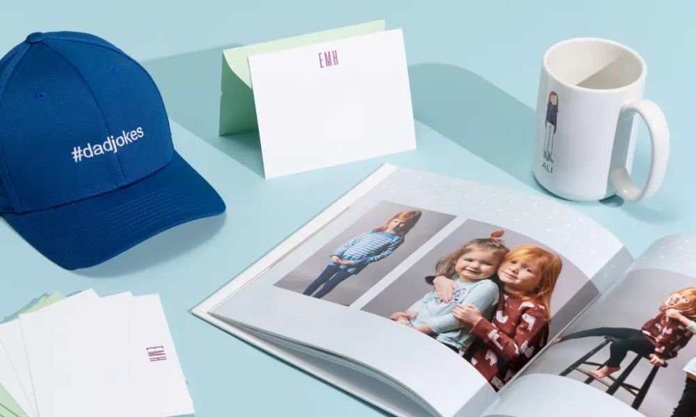 Personalized gifts including custom mug, photo book, and cap symbolizing gifts as a love language