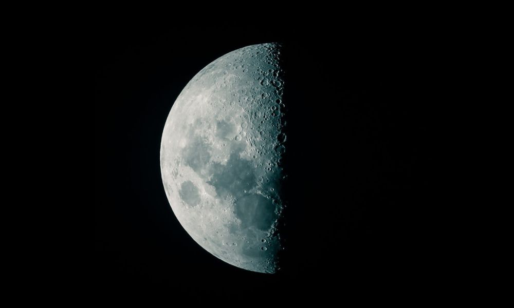 Third quarter moon phase showing the left half illuminated, symbolizing reflection, closure, and self-care
