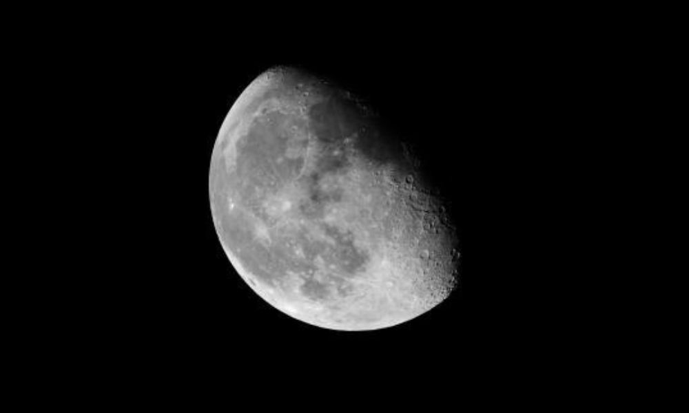Waning gibbous moon phase symbolizing release, reflection, and letting go of negativity
