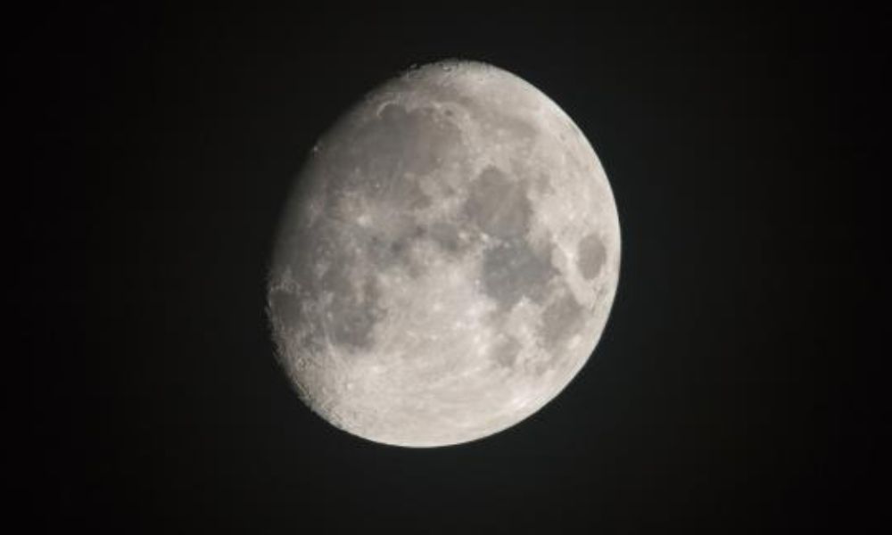 Waxing gibbous moon phase with more than half illuminated, symbolizing refinement, focus, and inner strength